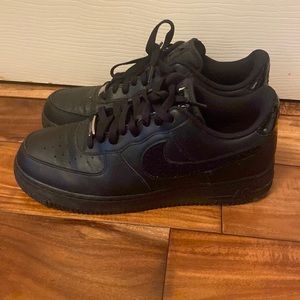 Nike Air Force 1 black fuzzy swoosh